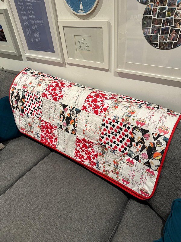 The quilt folded on a sofa