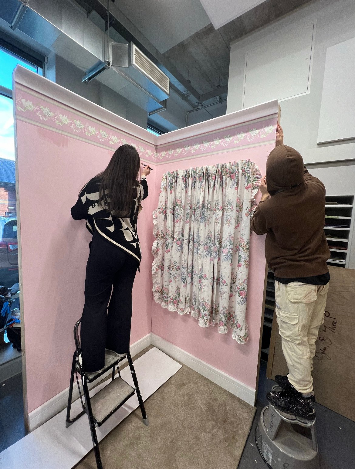 Installing the pink floral wallpaper