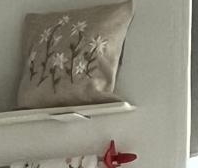 Embroidered edelweiss cushion